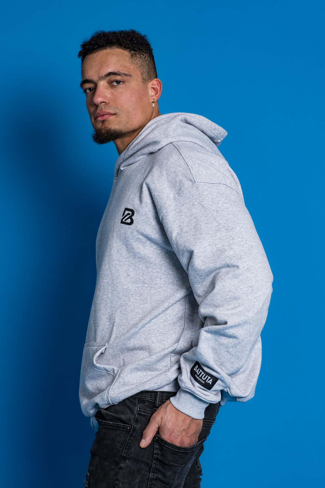 New Collection
BATTUTA HOODIE GREY